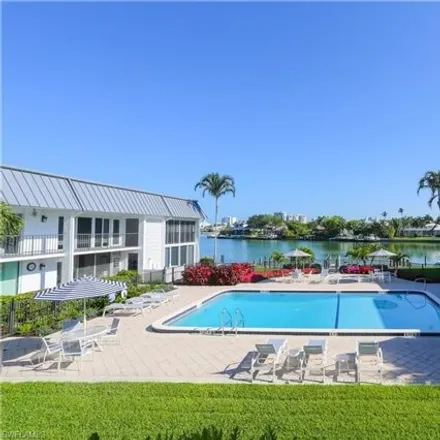 Rent this 2 bed condo on Orleans in Harbour Drive, Naples