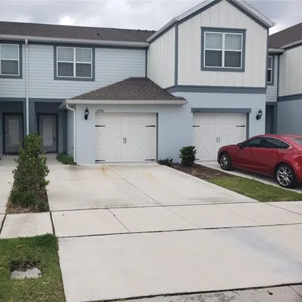 Rent this 2 bed townhouse on 3786 Plainview Dr in Orlando, Florida