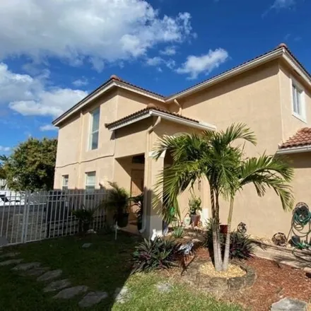 Buy this 4 bed house on 2100 Little Torch Street in Riviera Beach, FL 33407