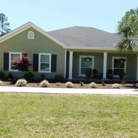 Buy this 4 bed house on 1 Ponderosa Drive in Wakulla County, FL 32327