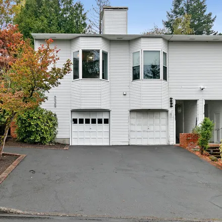 Buy this 2 bed townhouse on 6535 Southwest Canyon Court in Portland, OR 97225