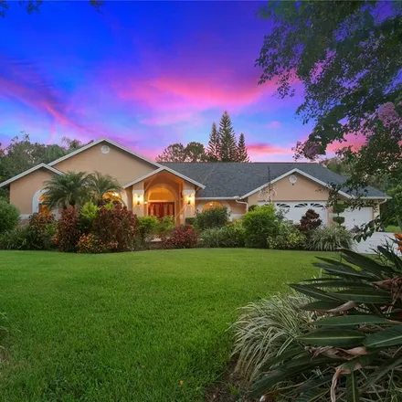 Buy this 5 bed house on 5993 Hammock Woods Drive in Hillsborough County, FL 33556