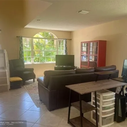 Buy this 3 bed house on 11769 Southwest 1st Street in Coral Springs, FL 33071
