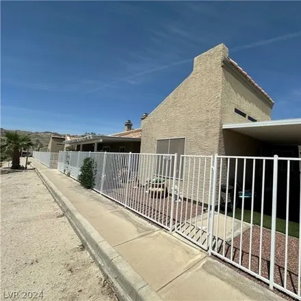 Buy this 3 bed house on 2235 High Dunes Ln Unit 2235 in Laughlin, Nevada