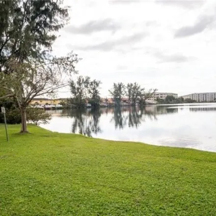 Rent this 2 bed condo on 10090 Northwest 80th Court in Hialeah Gardens, FL 33016