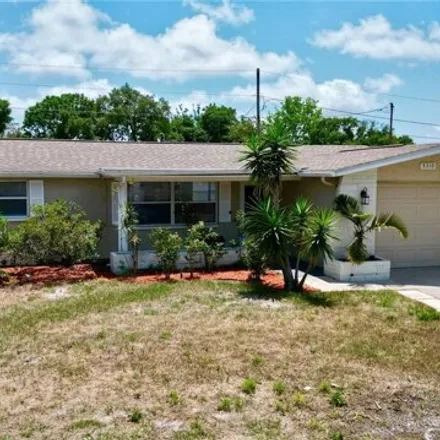 Buy this 3 bed house on 5268 Seafoam Drive in Elfers, FL 34652