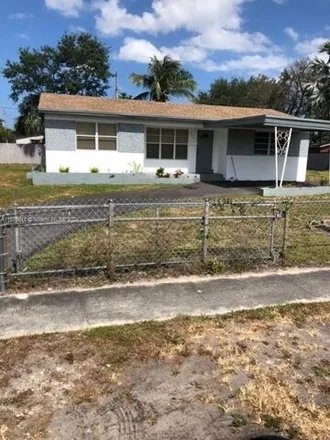 Rent this 3 bed house on 869 North 72nd Way in Hollywood, FL 33024