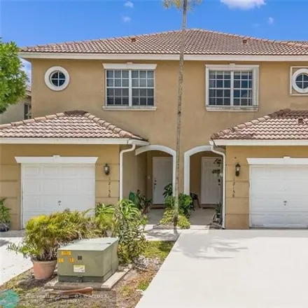 Buy this 3 bed townhouse on 12066 Southwest 5th Court in Pembroke Pines, FL 33025
