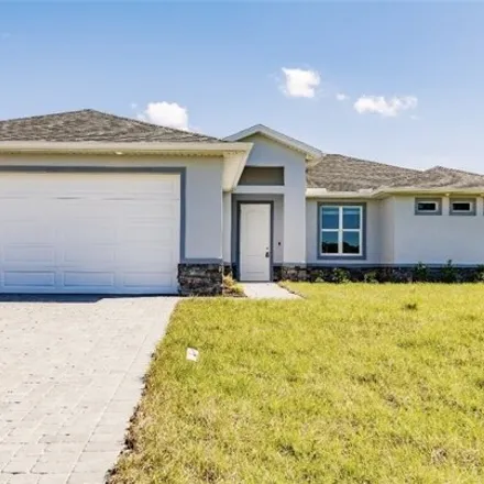 Rent this 4 bed house on 1499 Northwest 17th Place in Cape Coral, FL 33993