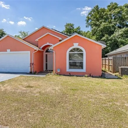 Buy this 4 bed house on 7644 Silver Crown Court in Orange County, FL 32818