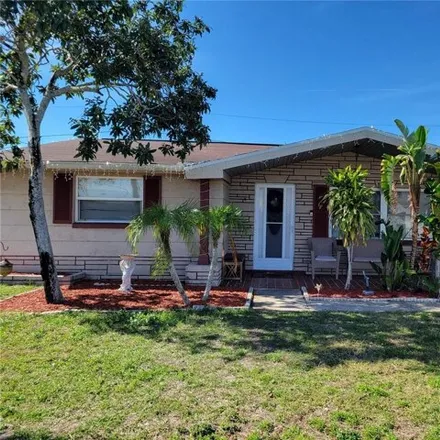 Buy this 3 bed house on 1153 Tamarac Dr in Holiday, Florida