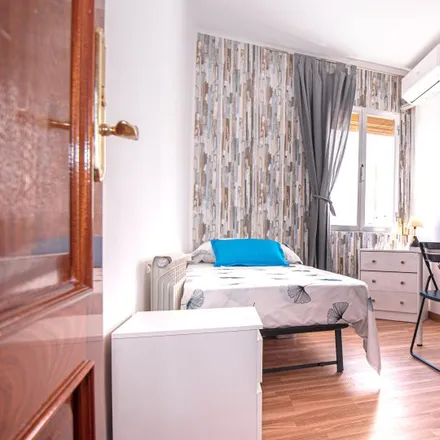 Rent this 4 bed room on Calle de Julia Nebot in 28025 Madrid, Spain