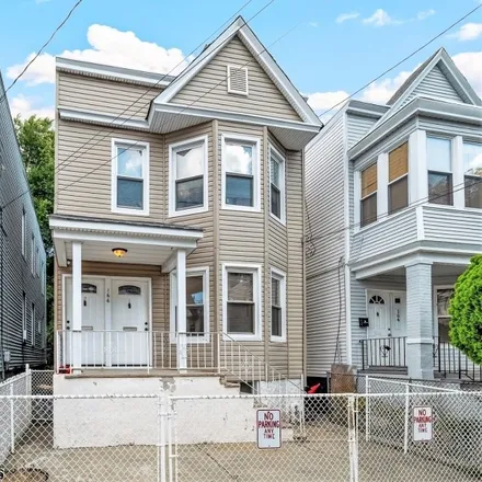 Buy this 5 bed townhouse on 141 Wilkinson Avenue in West Bergen, Jersey City