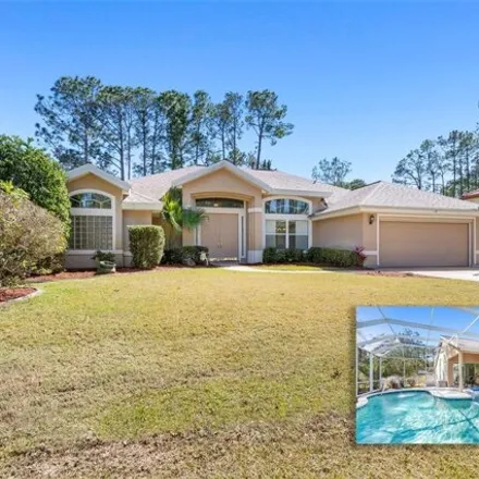 Buy this 3 bed house on 52 Edgar Lane in Palm Coast, FL 32164