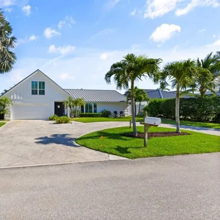 Buy this 4 bed house on 77 Leeward Circle in Tequesta, Palm Beach County