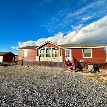 Buy this 3 bed house on 122069 Nissler Road in Nissler, Butte