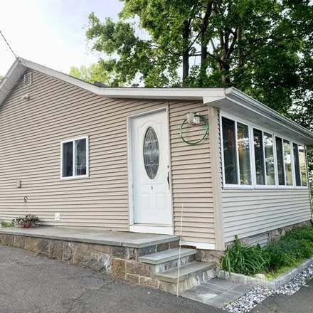Buy this 2 bed house on 13 Lake Drive in Lake Pocotopaug, East Hampton