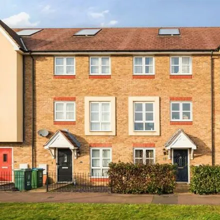 Buy this 4 bed townhouse on Stoke Mandeville Hospital in Stadium Approach, Aylesbury