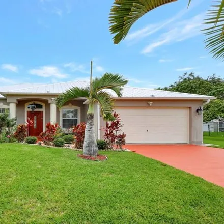 Buy this 3 bed house on 568 Southwest Duxbury Avenue in Port Saint Lucie, FL 34983