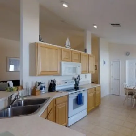 Rent this 3 bed apartment on 15599 Beach Pebble Way in Beachwalk Isles, Fort Myers