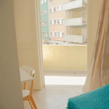 Rent this 4 bed room on Rua Actor Vale 45 in 1900-024 Lisbon, Portugal