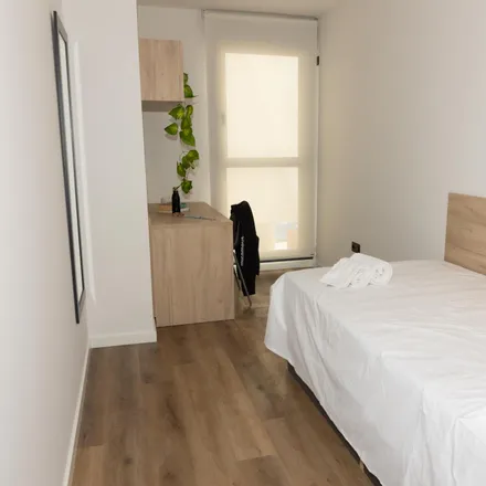 Rent this 4studio room on Calle Mariano Aser in 10, 46100 Burjassot