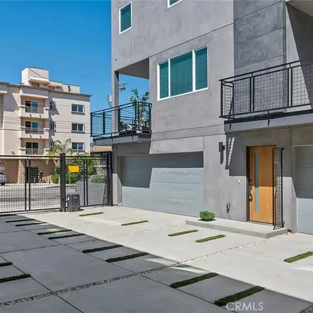 Rent this 4 bed apartment on 13550 Vanowen Street in Los Angeles, CA 91405