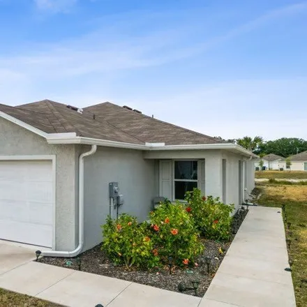 Buy this 3 bed house on 18280 Gibraltar Ln in Lehigh Acres, Florida