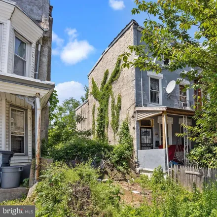 Buy this 4 bed townhouse on 319 East Armat Street in Philadelphia, PA 19144