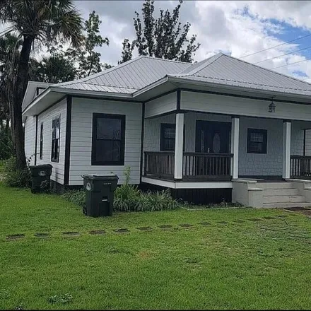 Buy this 4 bed house on 1119 New York Avenue in Lynn Haven, FL 32444