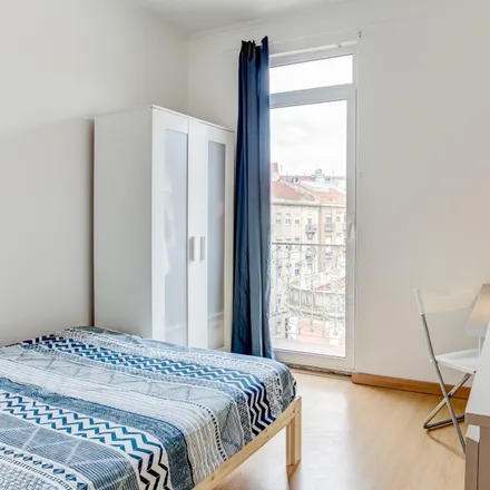 Rent this 6 bed room on Rua Carrilho Videira in 1170-347 Lisbon, Portugal