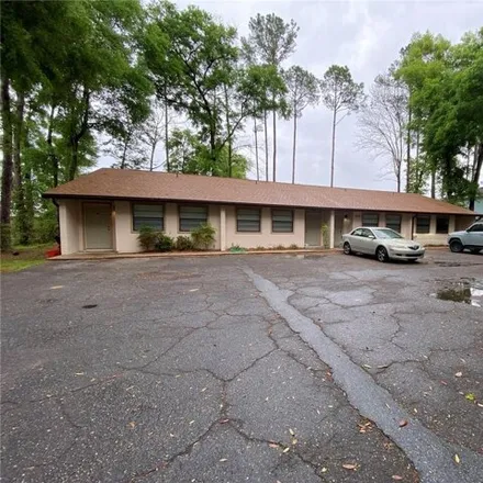 Rent this 2 bed apartment on 6906 Southwest 17th Place in Alachua County, FL 32607
