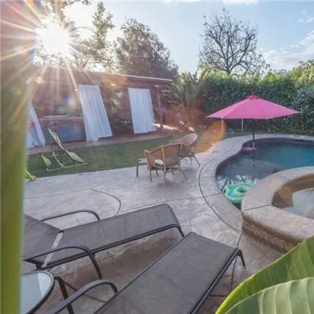 Rent this 4 bed house on 5714 Cantaloupe Ave in Sherman Oaks, California