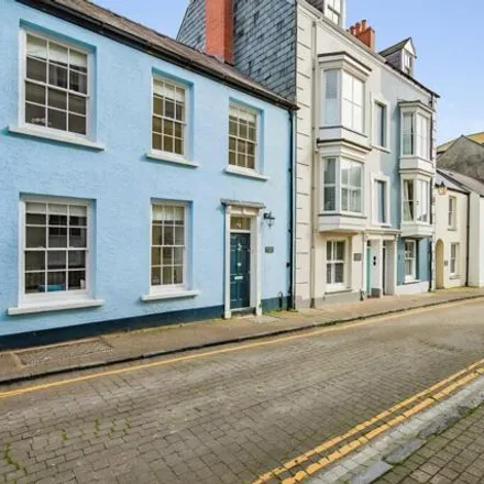Buy this 4 bed townhouse on St. Mary's Street in Tenby, SA70 7HW