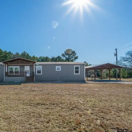 Buy this studio apartment on 662 Law Road in Harrison County, TX 75651