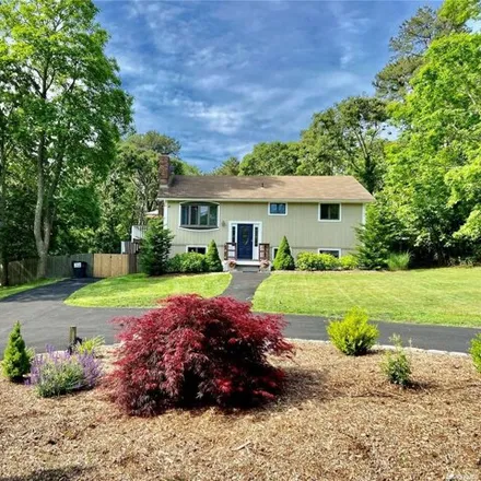 Rent this 4 bed house on 64 East Tiana Road in Southampton, Hampton Bays