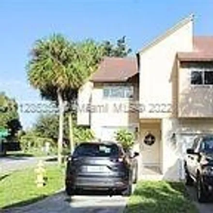 Rent this 4 bed townhouse on 8243 Northwest 8th Court in Plantation, FL 33324