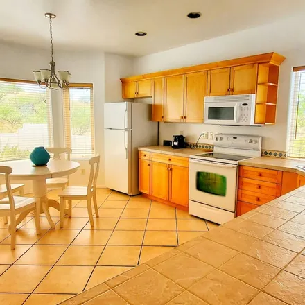 Rent this 3 bed house on Rio Rico in AZ, 85648
