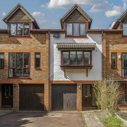 Buy this 4 bed townhouse on 5 Knowle Gardens in West Byfleet, KT14 6EL