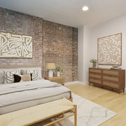 Rent this 3 bed townhouse on 254 West 123rd Street in New York, NY 10027