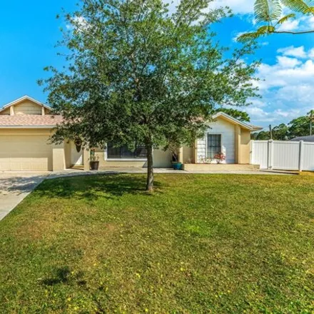 Buy this 3 bed house on 1031 Herne Avenue Northeast in Palm Bay, FL 32907