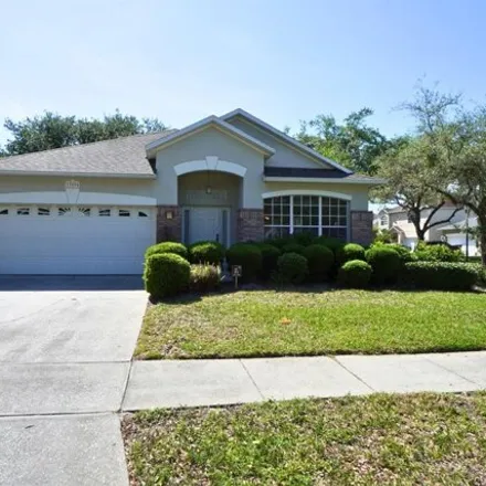 Rent this 4 bed house on 13517 Tetherline Trail in Orange County, FL 32837