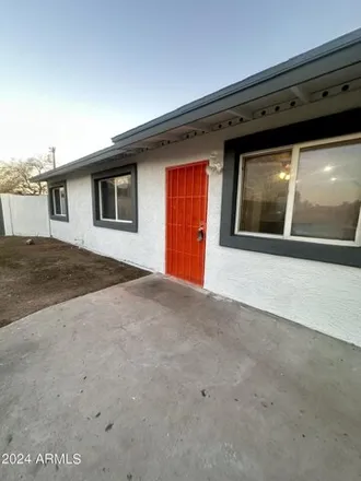 Buy this 3 bed house on 5233 South 14th Place in Phoenix, AZ 85040