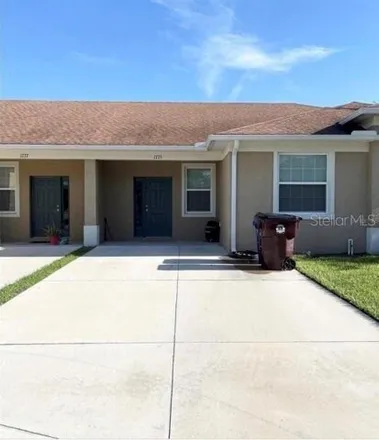 Rent this 3 bed townhouse on 1791 Barton Towne Circle in Saint Cloud, FL 34769