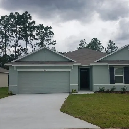 Rent this 4 bed house on Lake Diamond Golf and Country Club in 16 Golf View Drive, Ocala