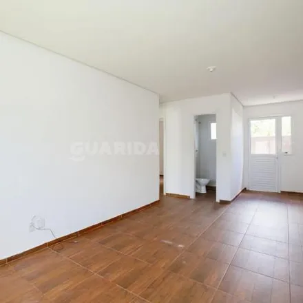 Rent this 2 bed house on Rua Santa Mônica in Ponta Grossa, Porto Alegre - RS