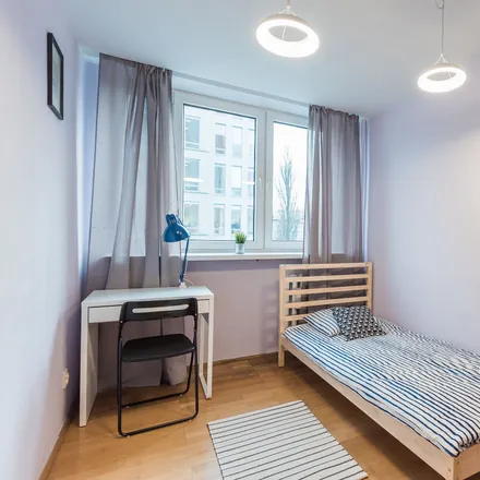 Rent this 3 bed room on Antoniego Malczewskiego 48/50 in 02-622 Warsaw, Poland