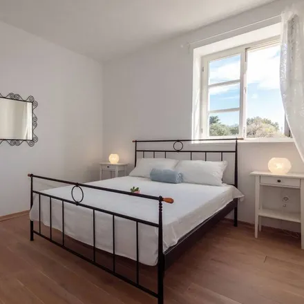 Rent this 4 bed house on 53294 Grad Novalja