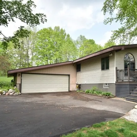 Buy this 4 bed house on 4461 Holly Ln in West Bend, Wisconsin
