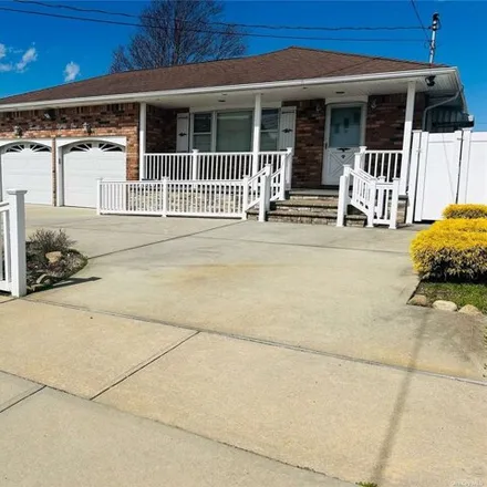 Buy this 4 bed house on 2381 Kenmore Street in East Meadow, NY 11554